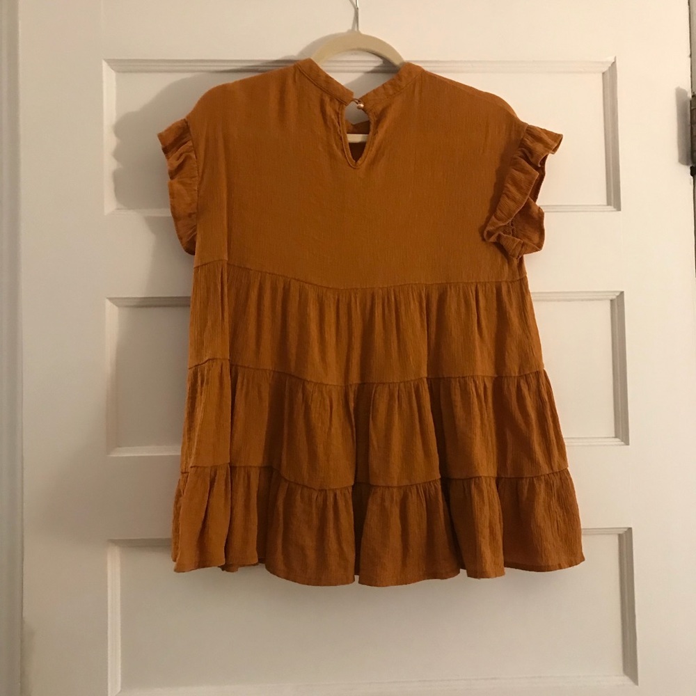 Orange tunic top from boutique